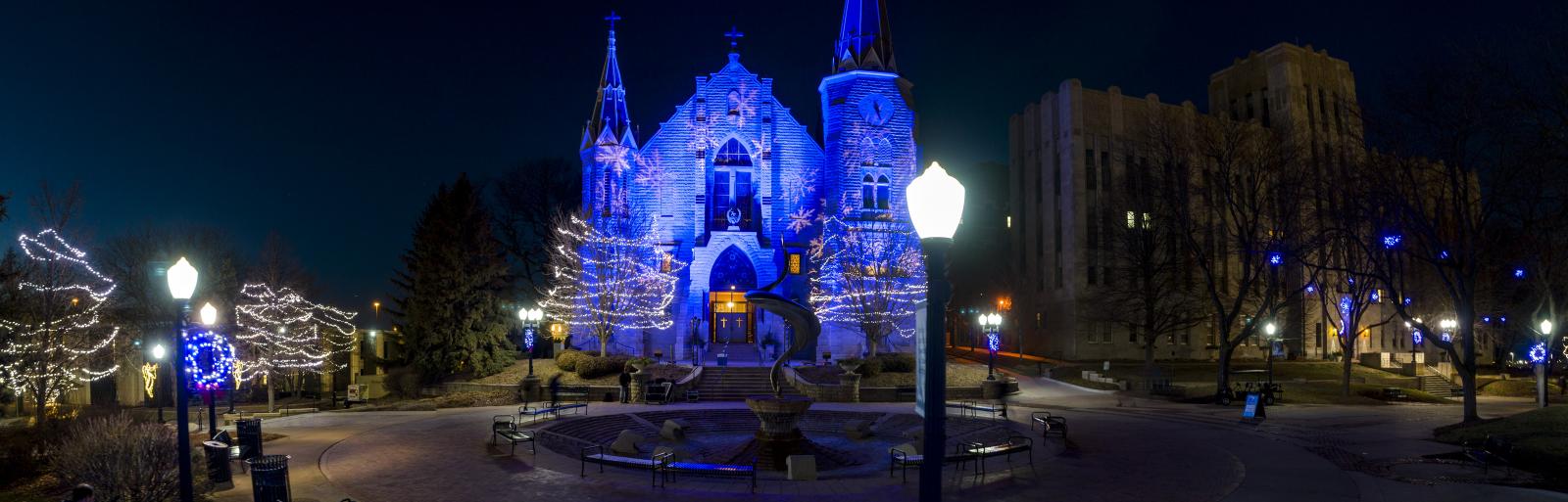 St. Johns at Christmas time with blue lights Creighton University